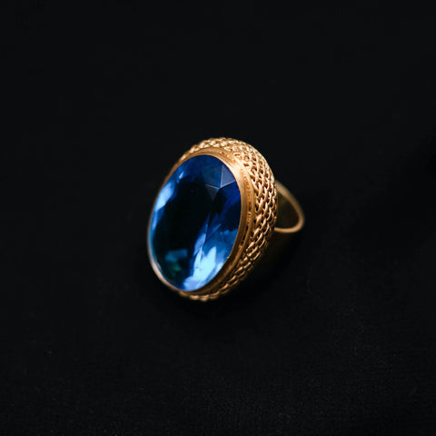 Anel dourado em prata e obsidiana azul