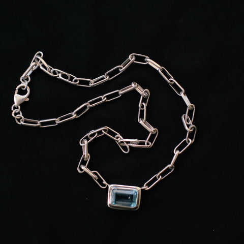 Chain with faceted blue topaz