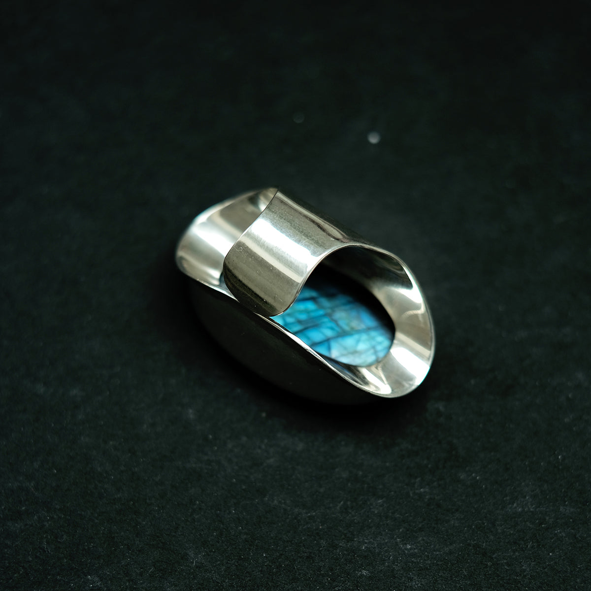 Silver ring with labradorite.